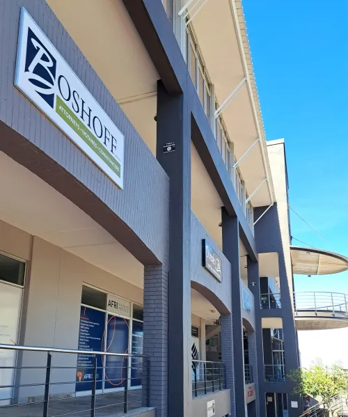 Sign outside of offices used by Boshoff Attorneys, Notaries & Conveyancers.